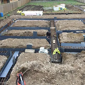 A picture of a construction site in the middle of the day.
