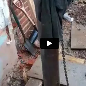 a man standing next to a fire hydrant