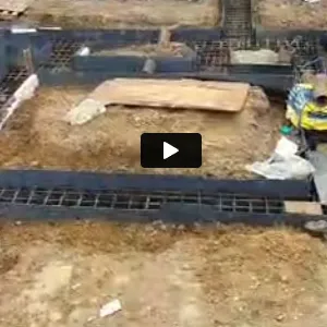 a construction worker is working on a building