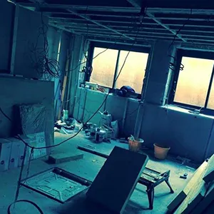 A room that has a lot of windows in it.