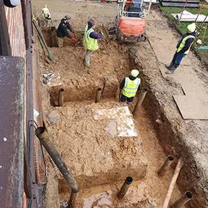 A group of men working on a construction site.