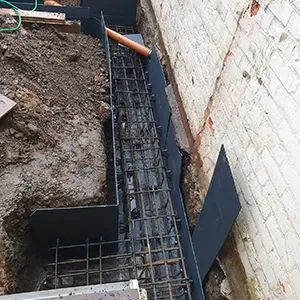 a man is working on a construction project