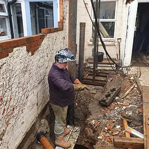 a man is working on a construction project